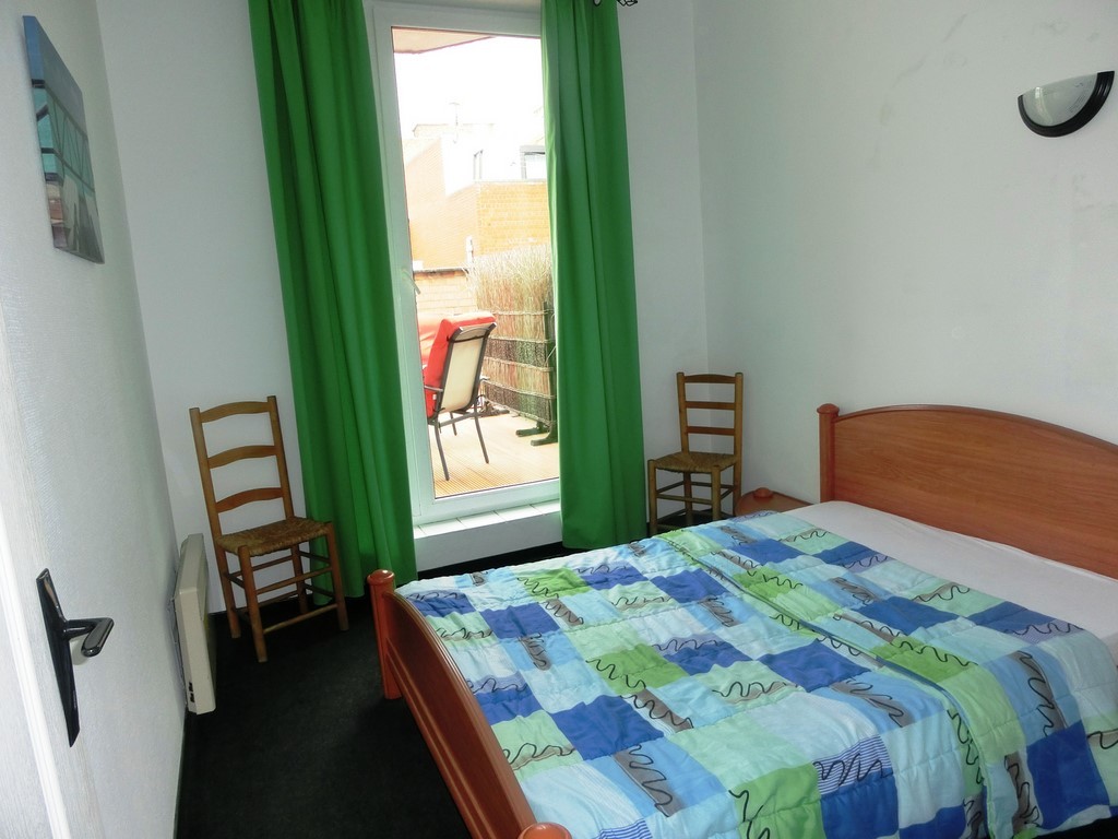 La première chambre de l'appartement Sloepen 2, à La Panne